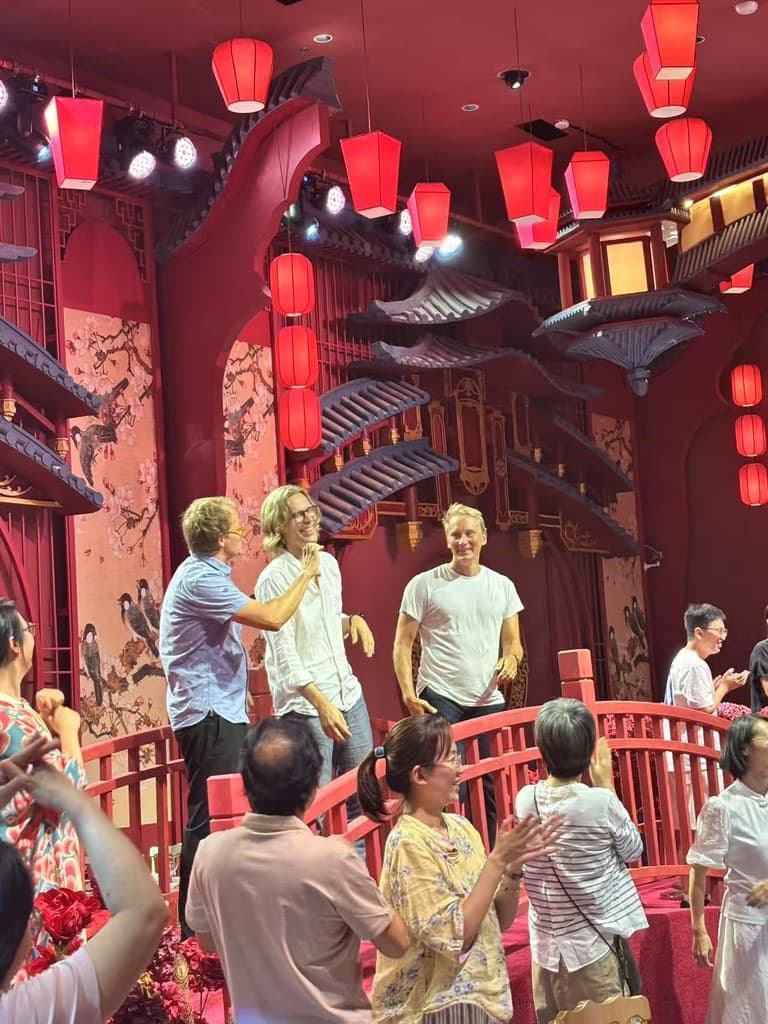 Finnish trainers at a venue decorated with red lanterns in Nanchang
