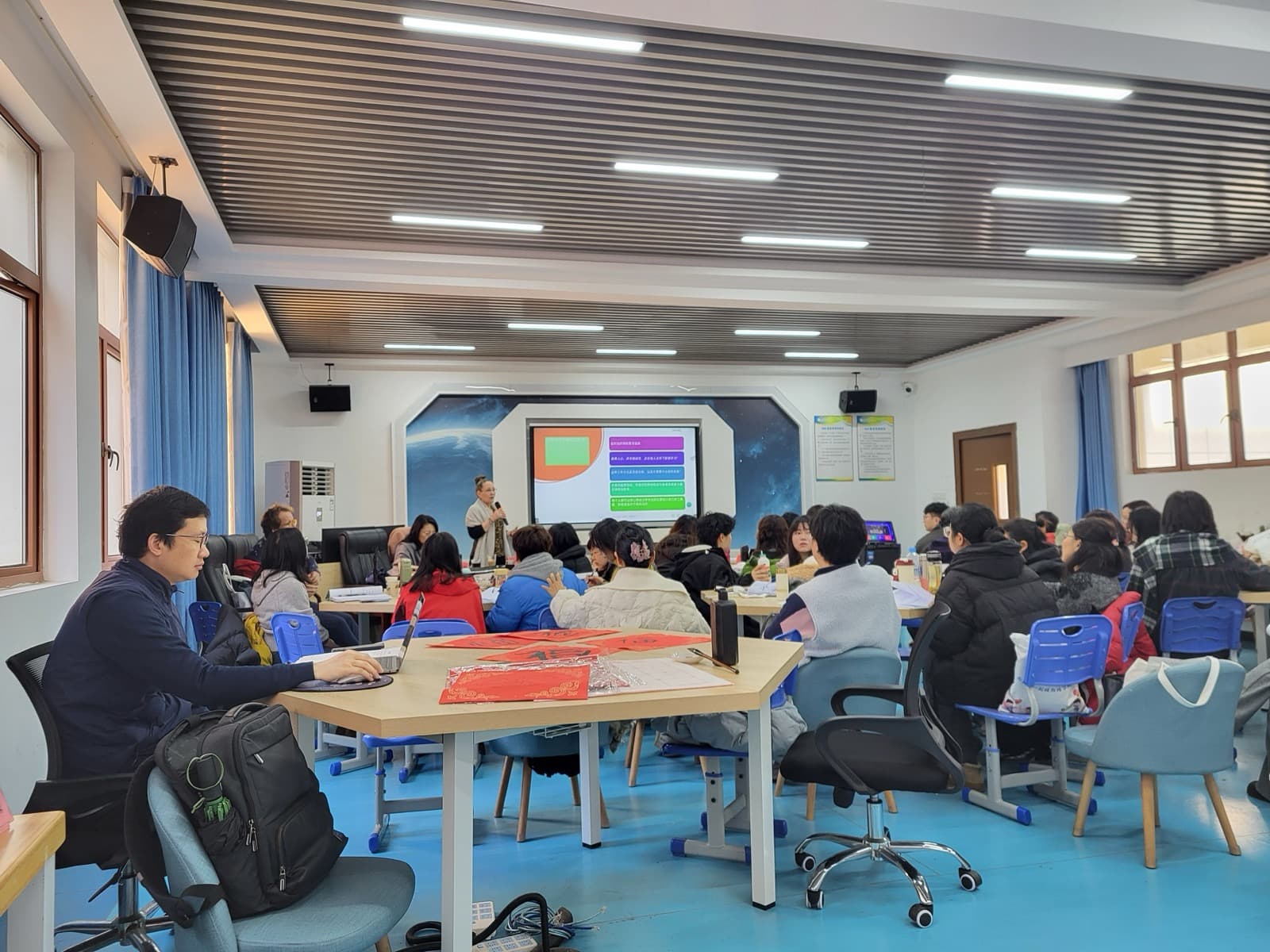 Training session in progress — space-themed classroom, Nanchang